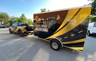 Truck and trailer wrapped with colourful branding