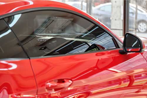 windows on a ford mustang tinted in 18% XPEL ceramic window tint